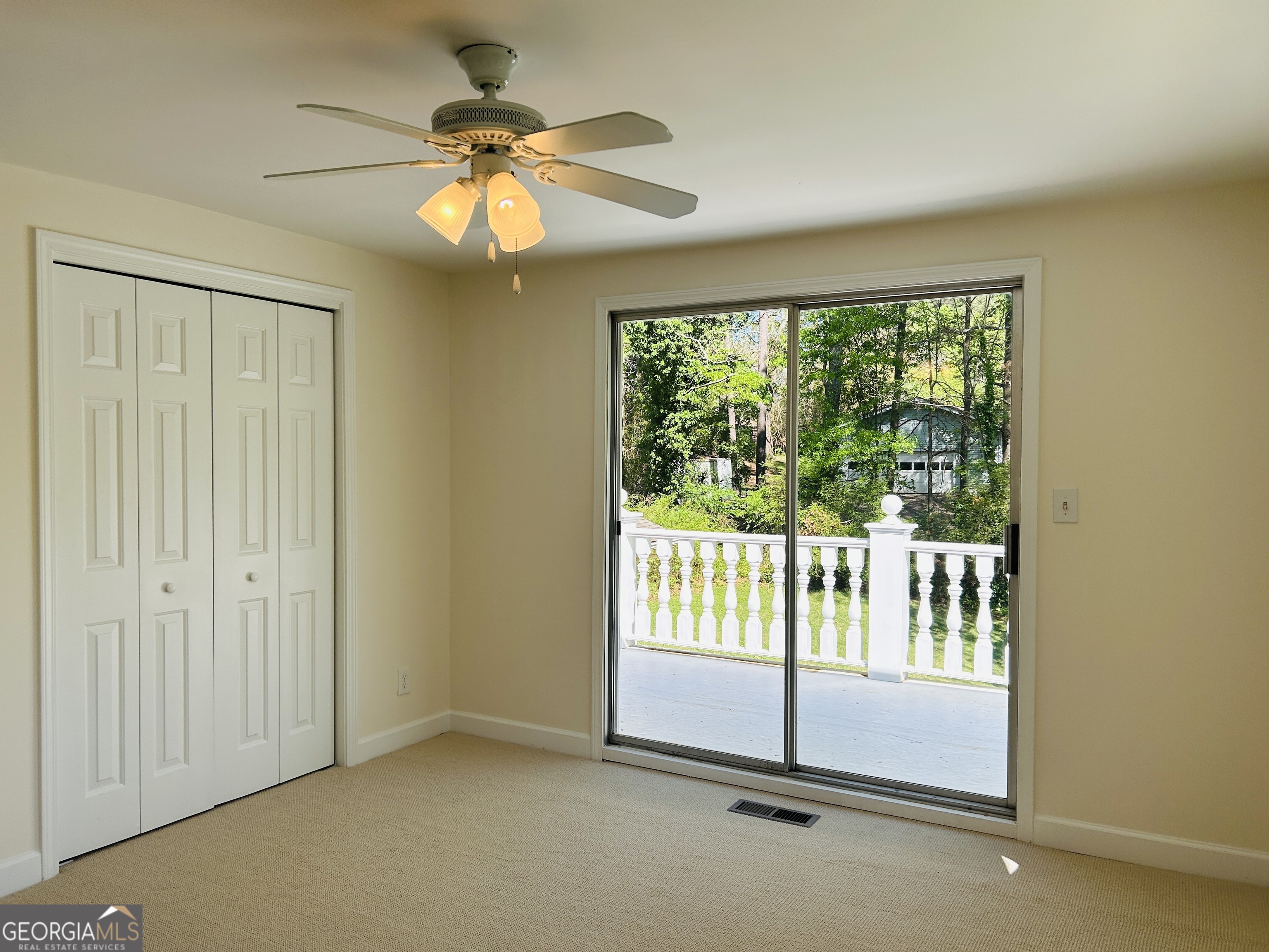 2131 Perrin Drive Lawrenceville, GA 30043 - Photo 48 of 60 a view of an empty room with a window