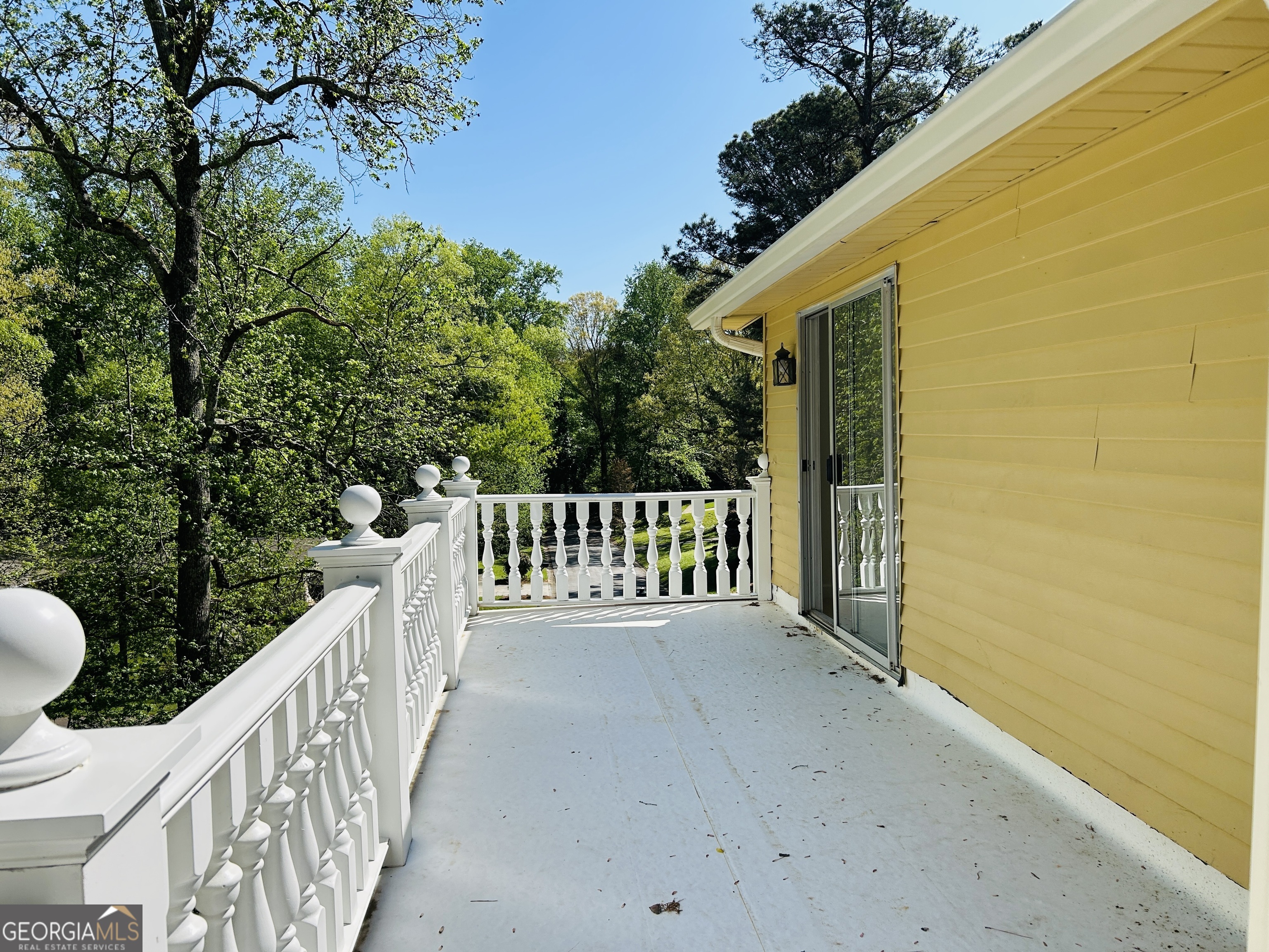 2131 Perrin Drive Lawrenceville, GA 30043 - Photo 50 of 60 a view of a wooden fence and trees