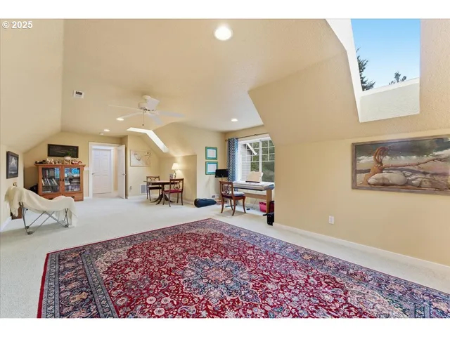 a bedroom with a bed and a dresser in it