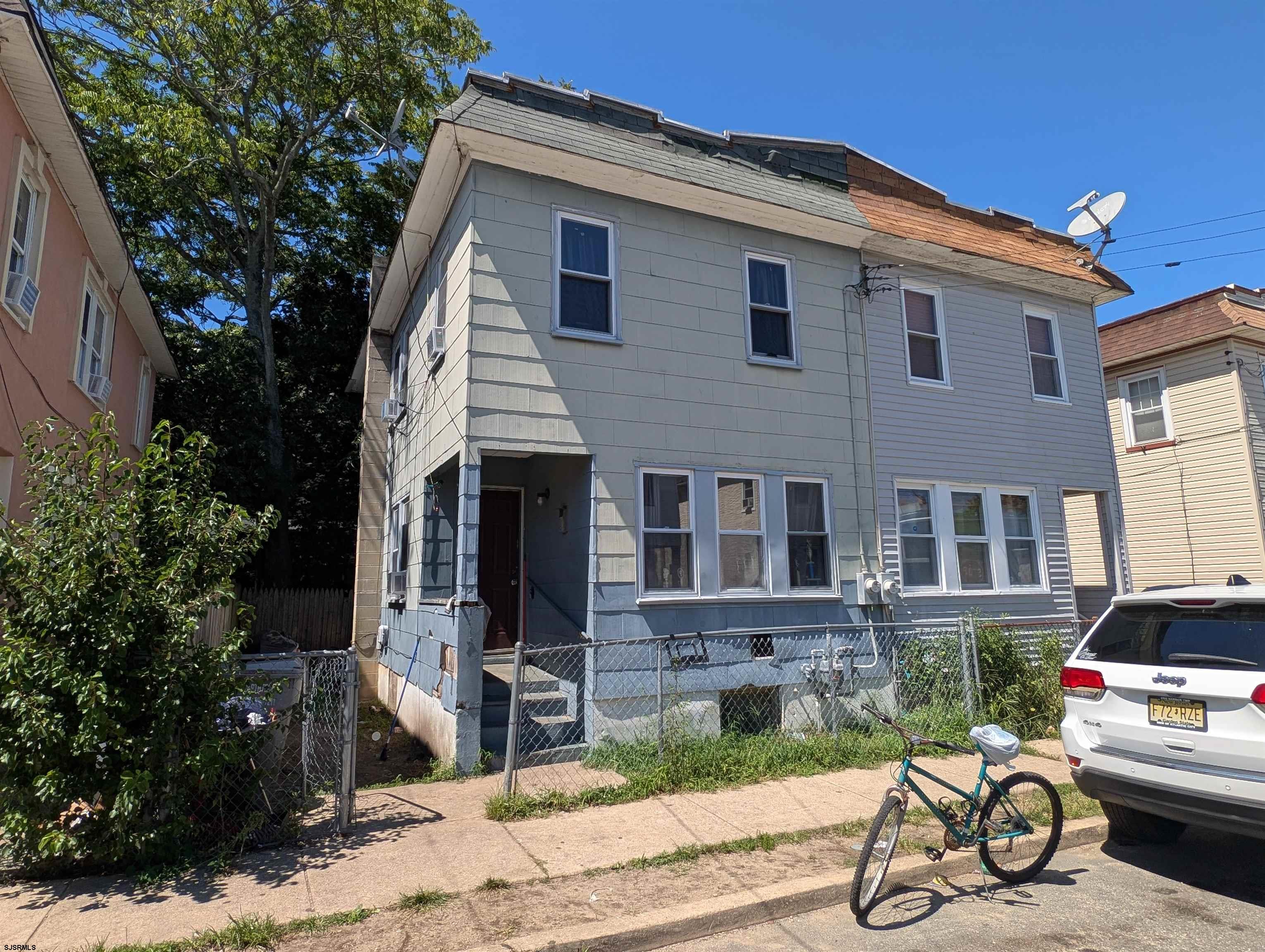 237 Guard Place Pleasantville, NJ 08232 - Photo 11 of 16 a car parked in front of a house