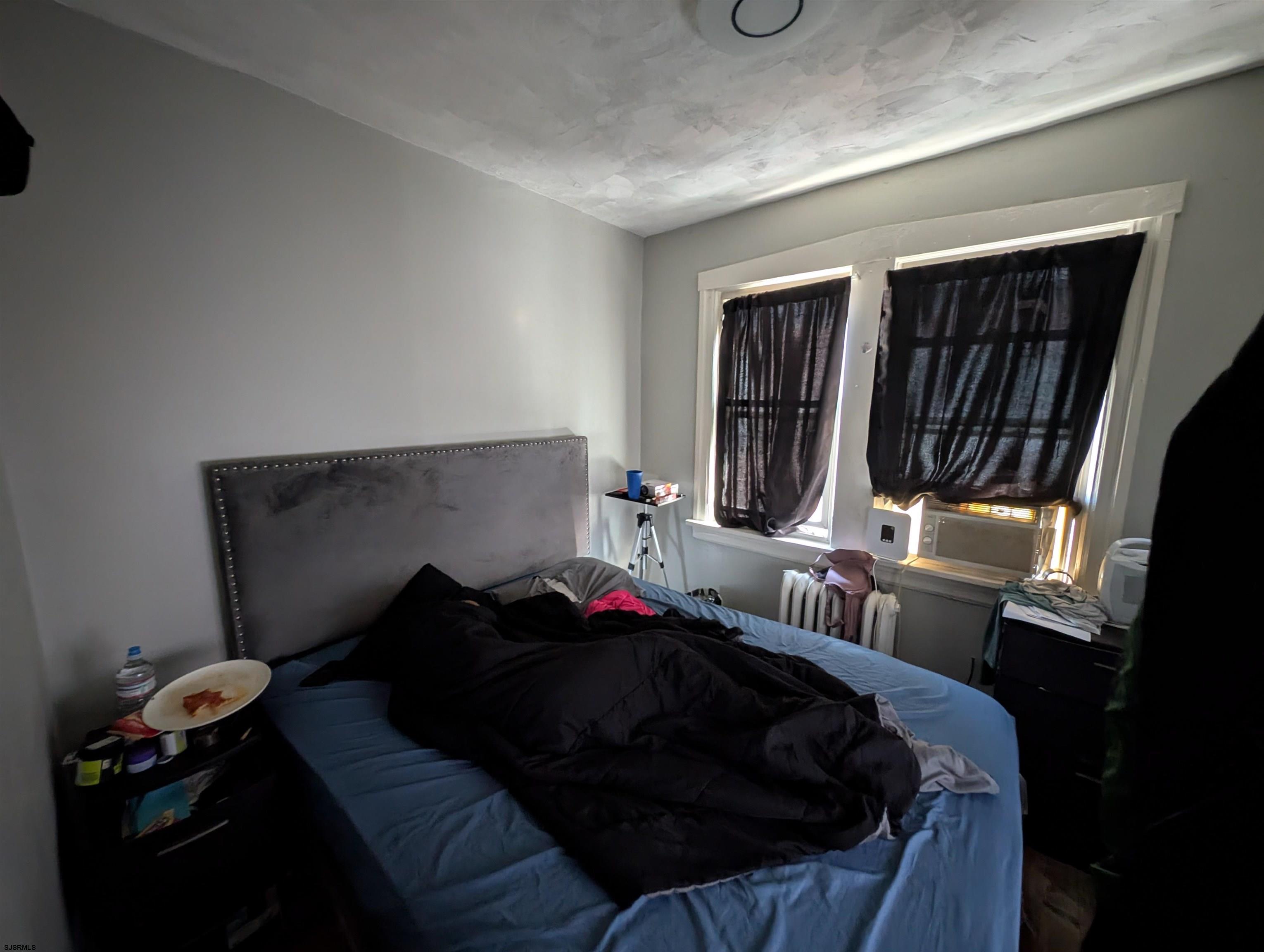 237 Guard Place Pleasantville, NJ 08232 - Photo 8 of 16 a living room with furniture and a window