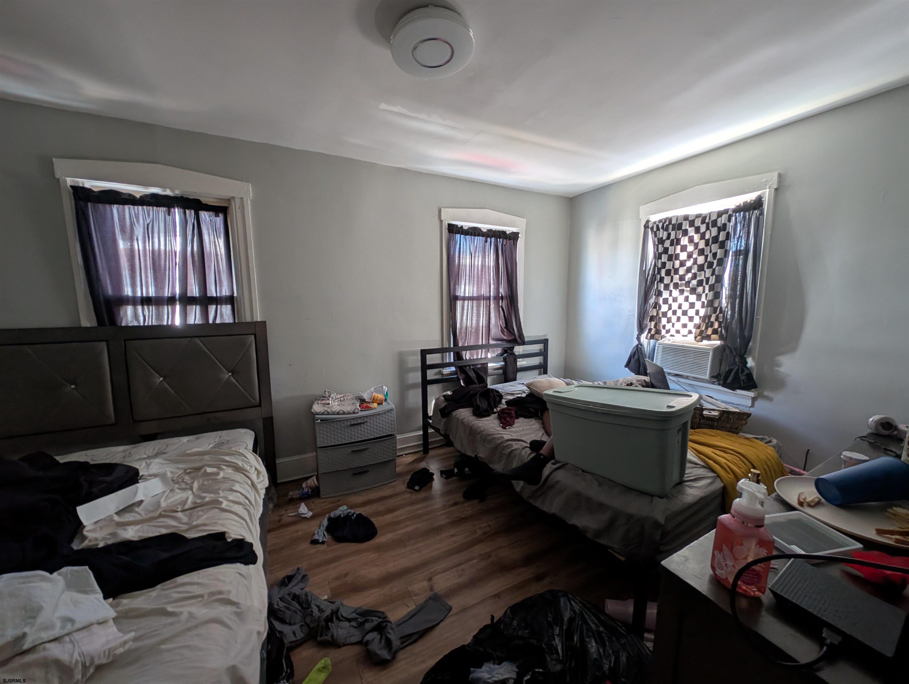 237 Guard Place Pleasantville, NJ 08232 - Photo 9 of 16 a living room with furniture and a window