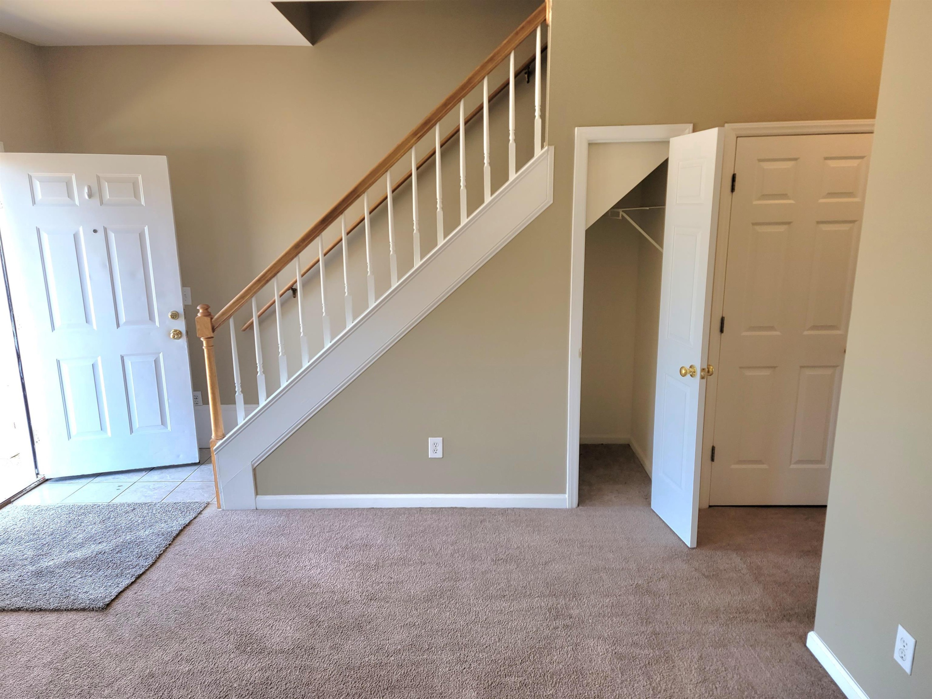 213 Dairy Road Clayton, NC 27520 - Photo 12 of 31 a view of an entryway with staircase