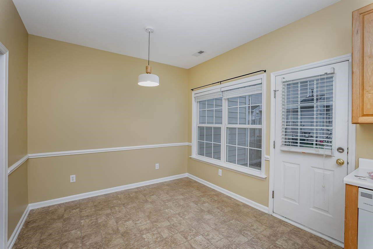 213 Dairy Road Clayton, NC 27520 - Photo 16 of 31 a view of an empty room with a window