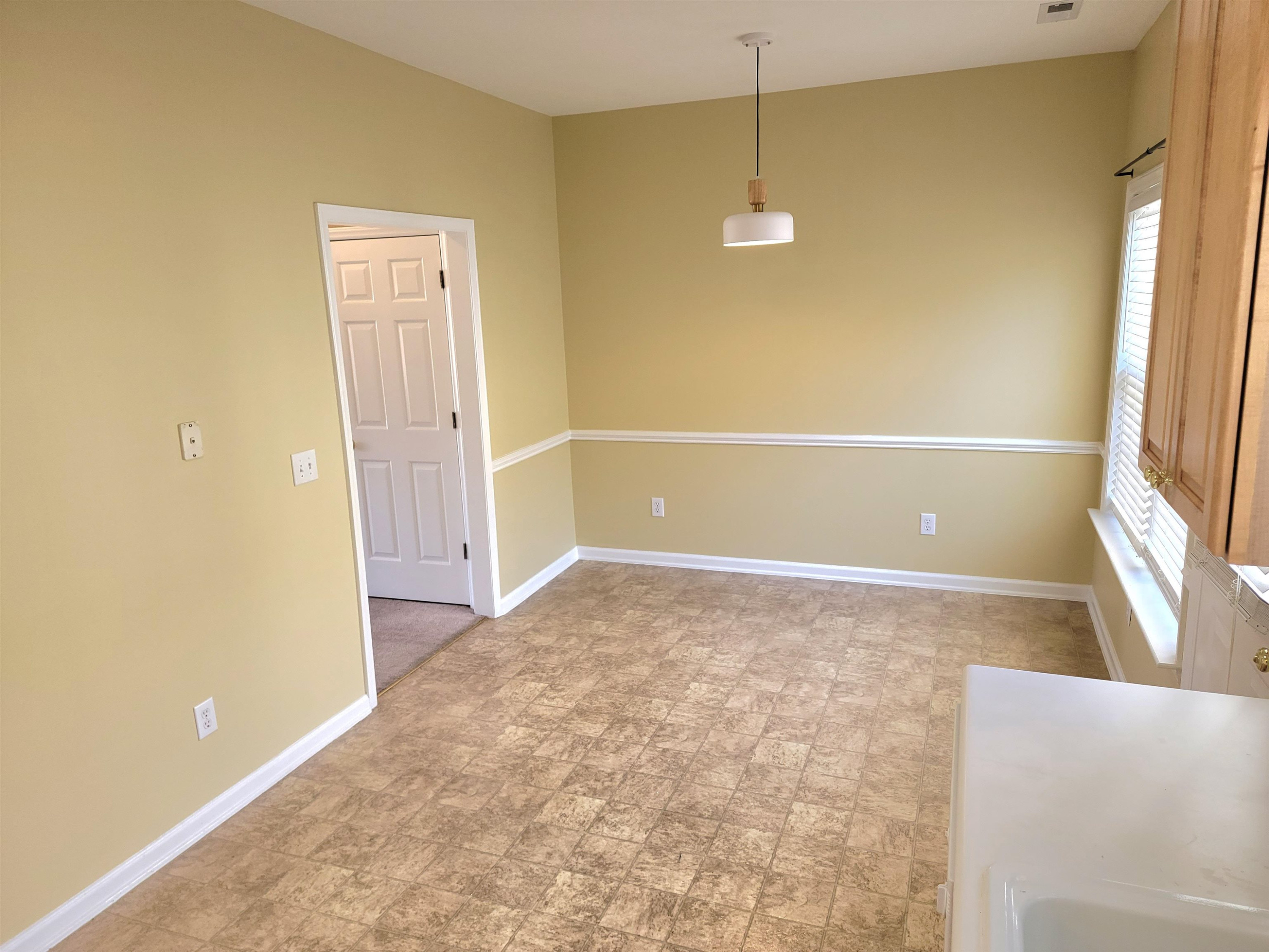 213 Dairy Road Clayton, NC 27520 - Photo 17 of 31 a view of a room with an empty space