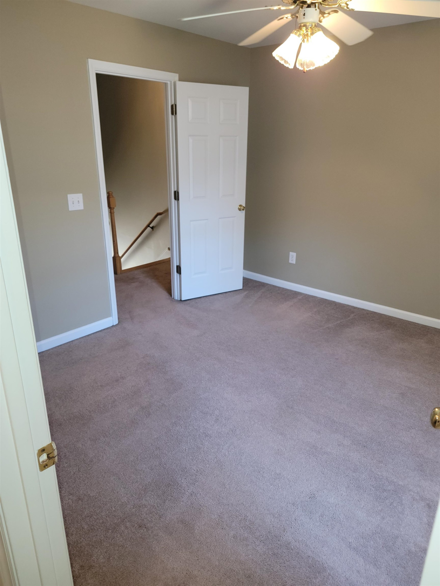 213 Dairy Road Clayton, NC 27520 - Photo 20 of 31 an empty room with a mirror