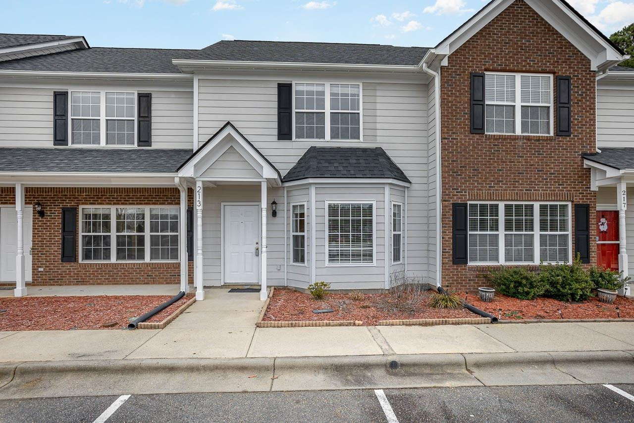 213 Dairy Road Clayton, NC 27520 - Photo 2 of 31 a front view of a house