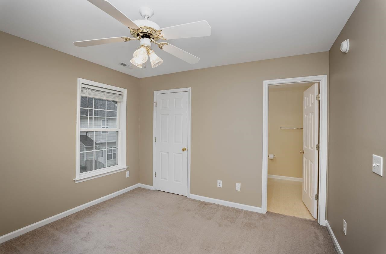 213 Dairy Road Clayton, NC 27520 - Photo 26 of 31 a view of an empty room with a window