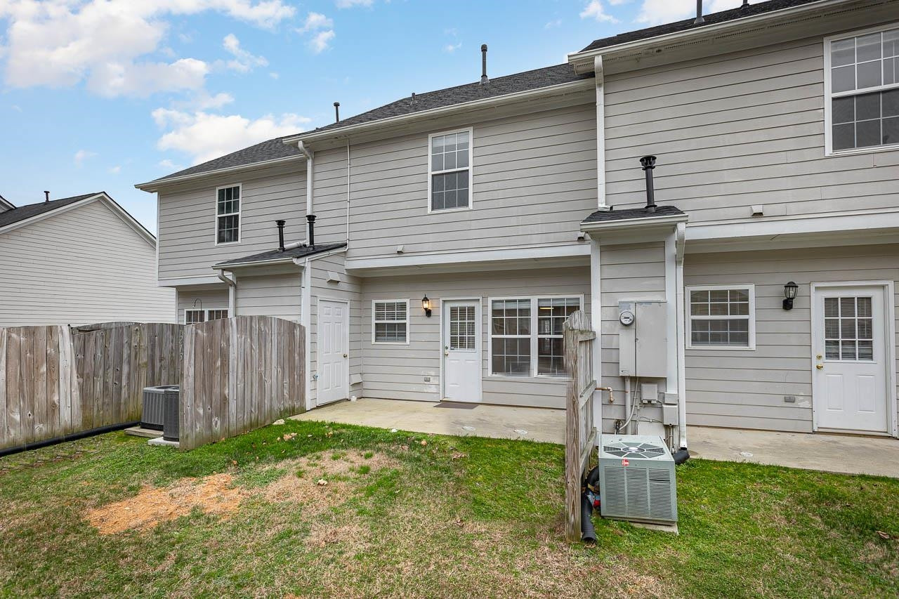 213 Dairy Road Clayton, NC 27520 - Photo 29 of 31 a front view of a house with a yard