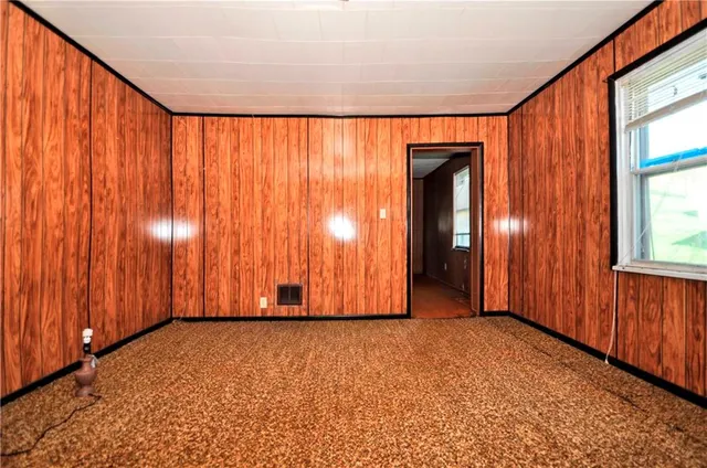 a view of a room with a window and a balcony