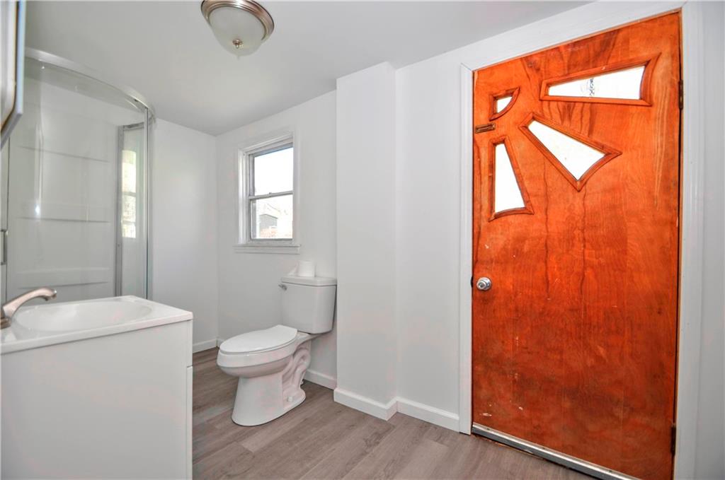 2014 5th Street Cardale, PA 15420 - Photo 22 of 32 a bathroom with a toilet sink and mirror