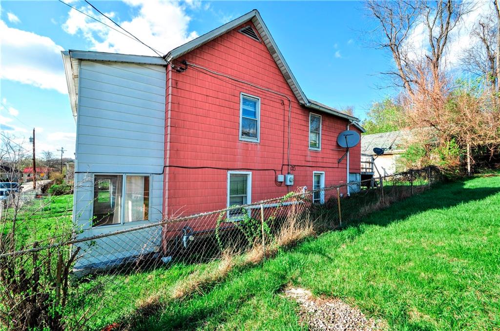 2014 5th Street Cardale, PA 15420 - Photo 24 of 32 a front view of a house with a yard