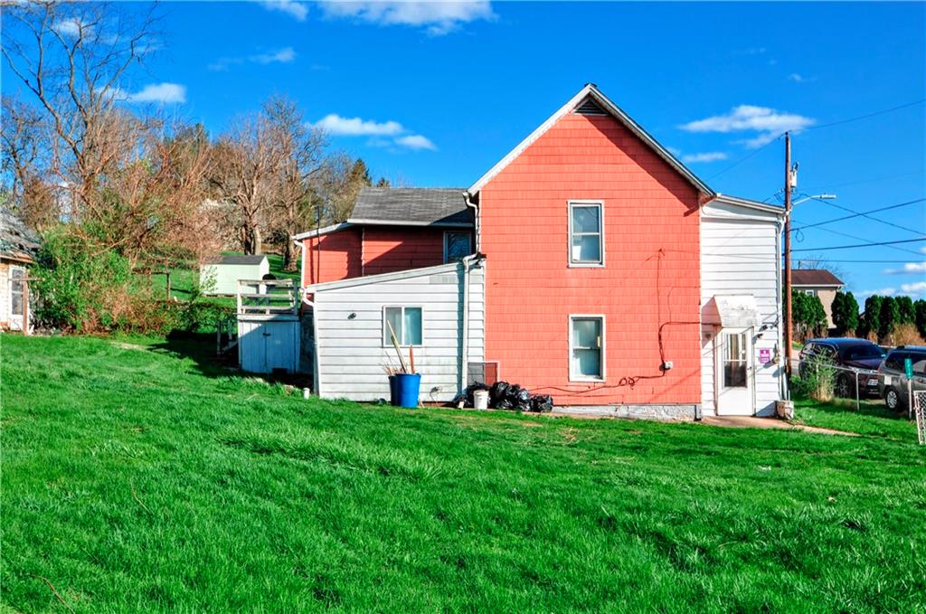 2014 5th Street Cardale, PA 15420 - Photo 26 of 32 a front view of a house with a yard and trees