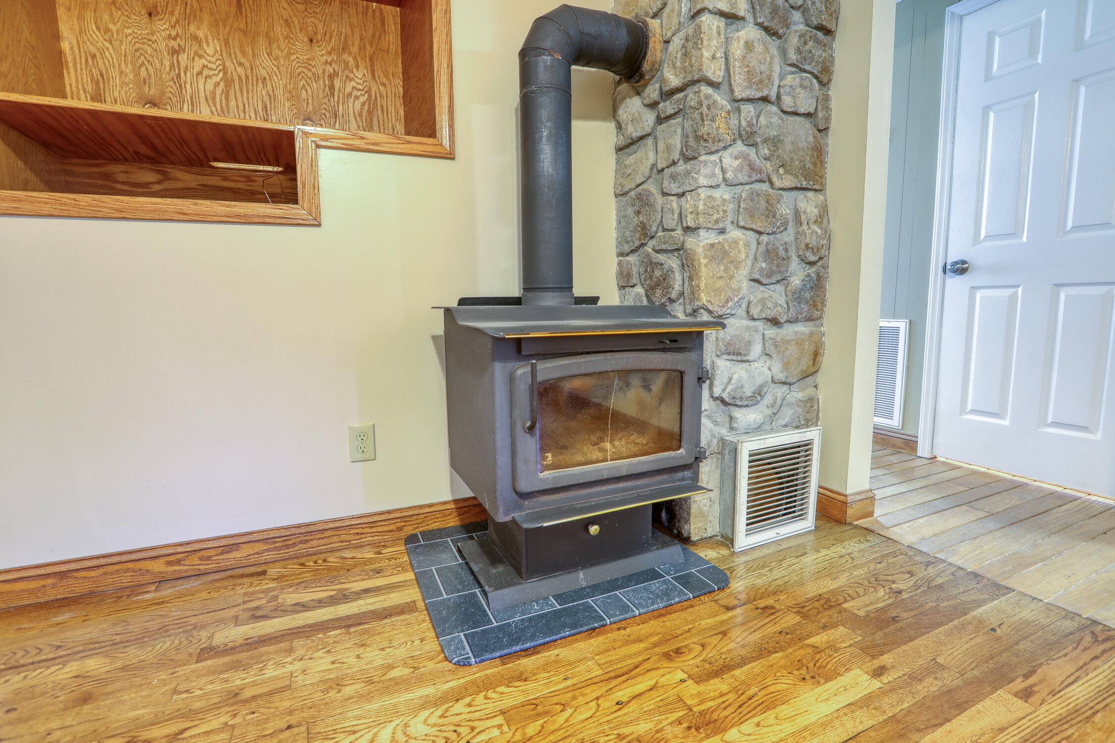 356 Gravely Valley Road Surgoinsville, TN 37873 - Photo 52 of 69 Wood stove living room.