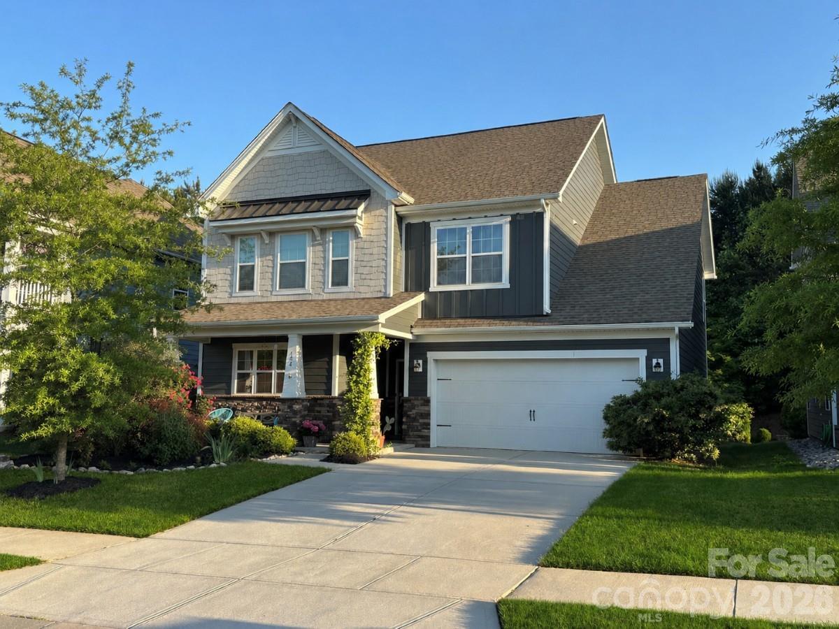 134 Dry Rivers Lane Mooresville, NC 28117 - Photo 1 of 29 a front view of a house with a garden and plants