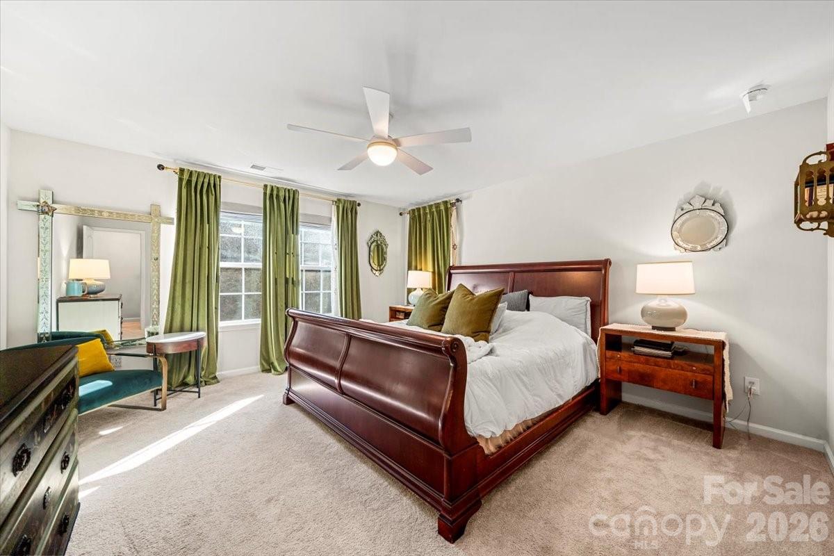 134 Dry Rivers Lane Mooresville, NC 28117 - Photo 14 of 29 a bed room with a bed and a chair