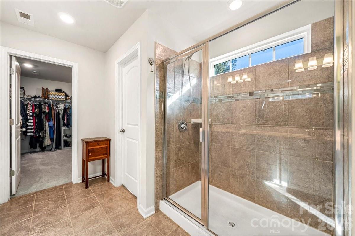 134 Dry Rivers Lane Mooresville, NC 28117 - Photo 16 of 29 a bathroom with a shower