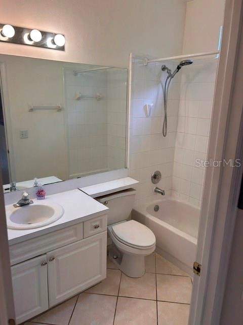350 Northwest 50th Boulevard, Unit 350 Gainesville, FL 32607 - Photo 14 of 16 a bathroom with a sink a toilet and shower