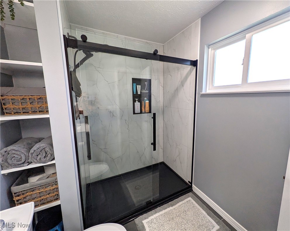 1127 Mayfield Ridge Road Cleveland, OH 44124 - Photo 24 of 47 Bathroom with a marble finish shower