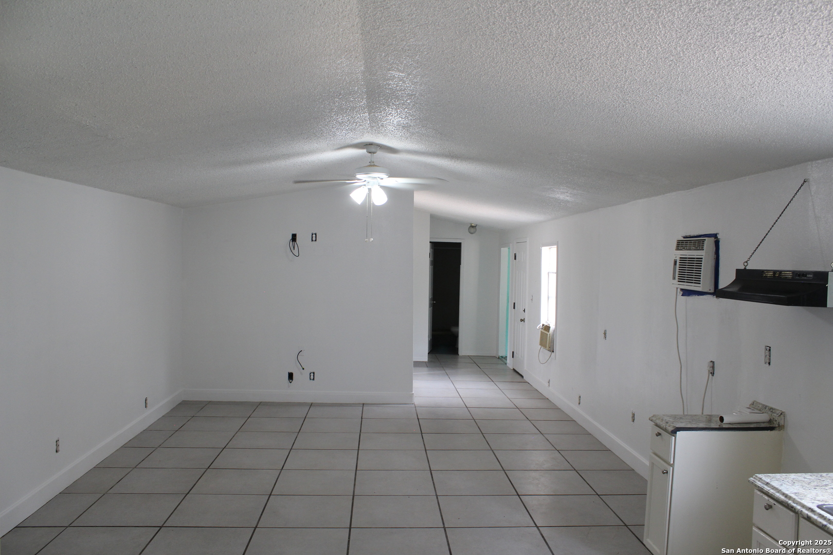 406 County Road 6850, Unit 2 Lytle, TX 78052 - Photo 10 of 15 wooden floor in an empty room