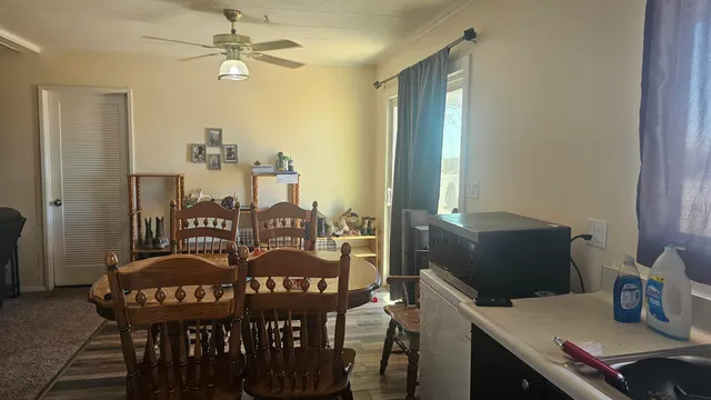 a view of a livingroom with furniture