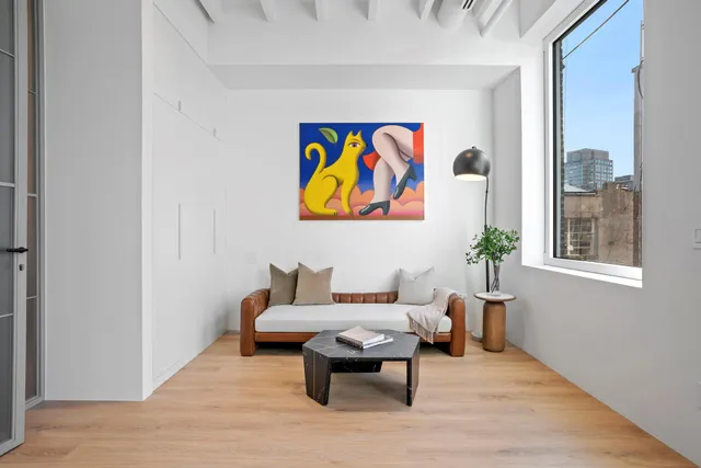 a picture of a wall with white wall with a white wall and picture