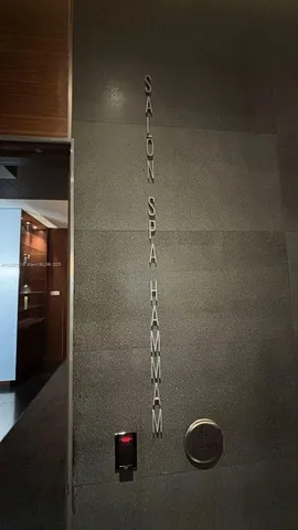 a room with gym equipment and a large window