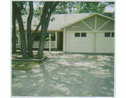 4801 Brook Crest Road Austin, TX 78744 - Photo 1 of 1 a view of a backyard