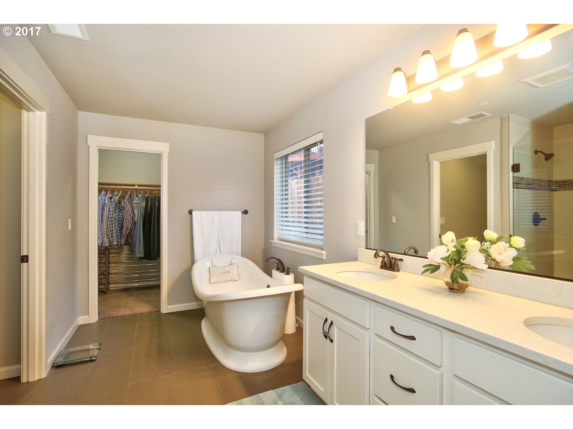 12723 Southwest Willow Point Lane Tigard, OR 97224 - Photo 13 of 27 a bathroom with a sink a toilet and mirror