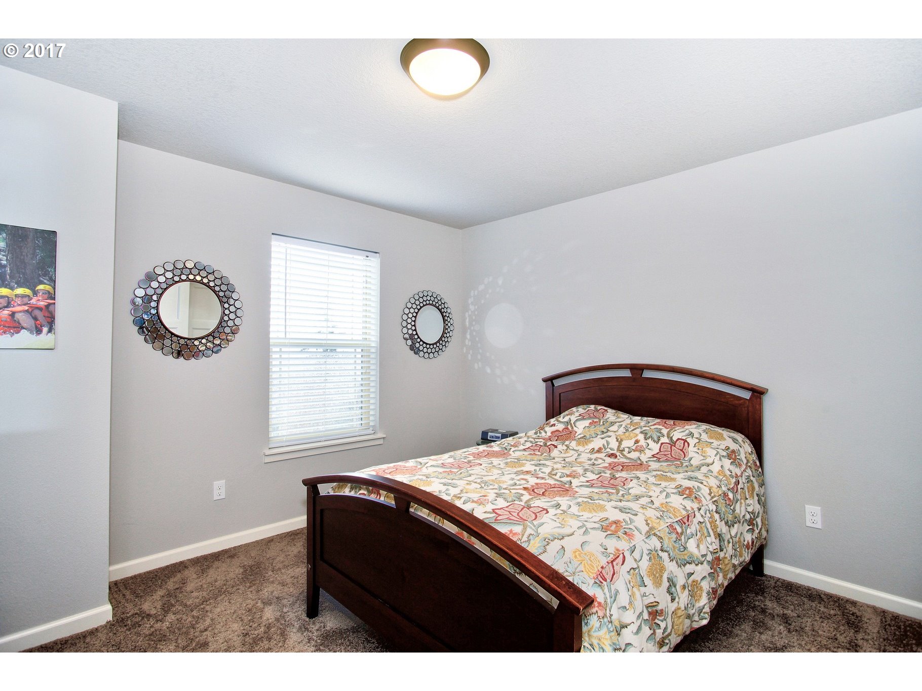 12723 Southwest Willow Point Lane Tigard, OR 97224 - Photo 18 of 27 a bedroom with a bed and window