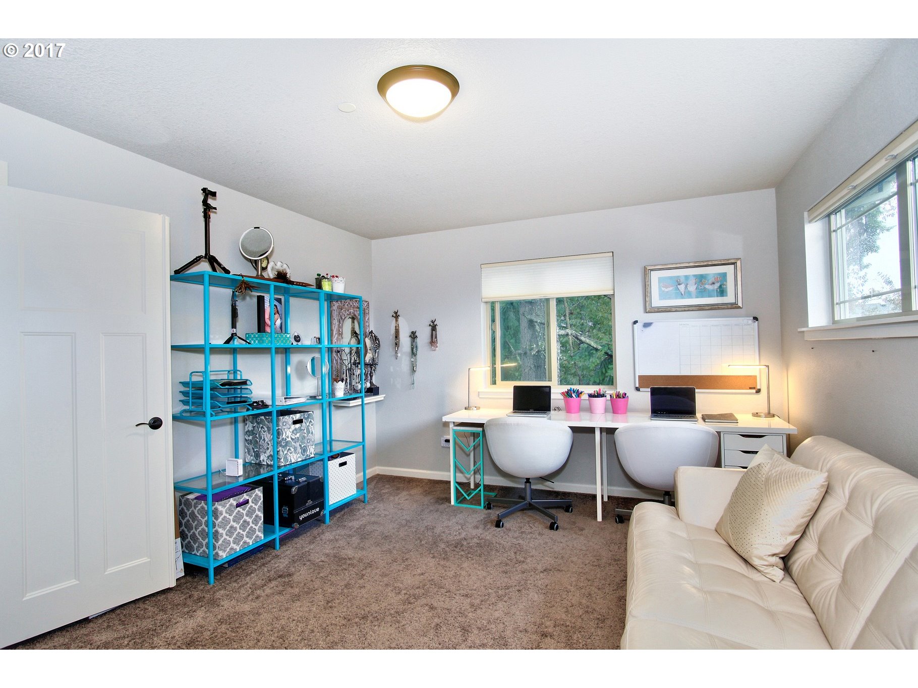 12723 Southwest Willow Point Lane Tigard, OR 97224 - Photo 22 of 27 a living room with furniture a window and bookshelf