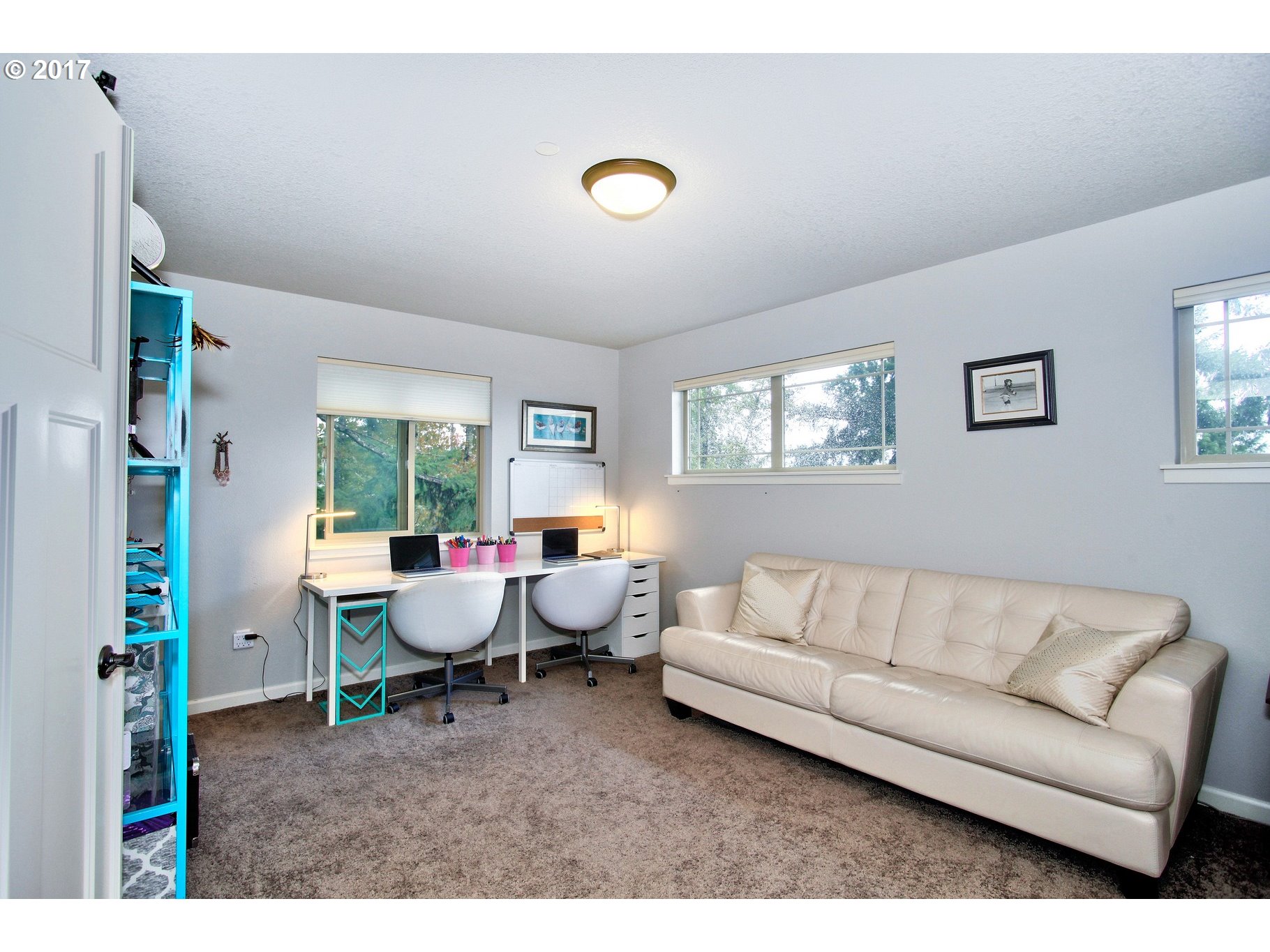 12723 Southwest Willow Point Lane Tigard, OR 97224 - Photo 23 of 27 a living room with furniture and a large window