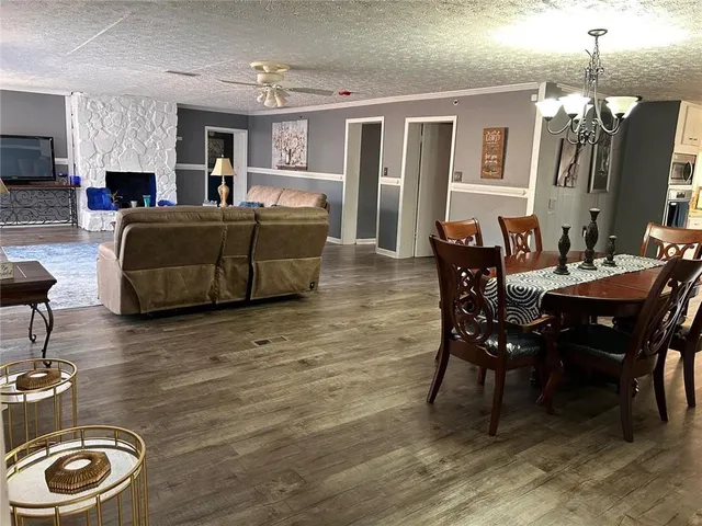 a bathroom with sink mirror and window