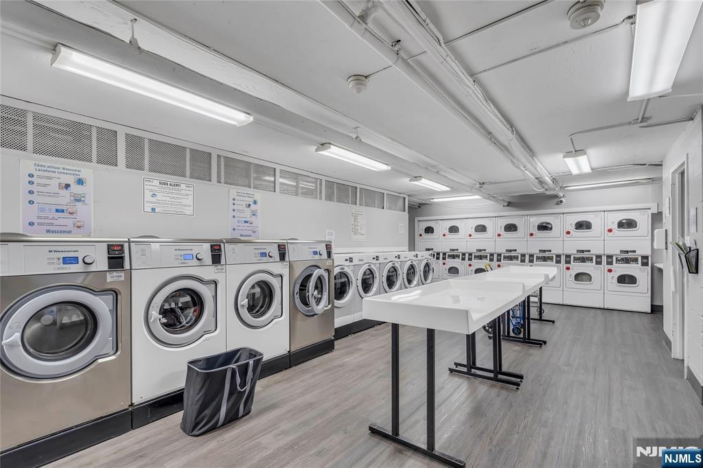 6600 Boulevard East, Unit 8A West New York, NJ 07093 - Photo 6 of 24 a view of a room with washer and dryer