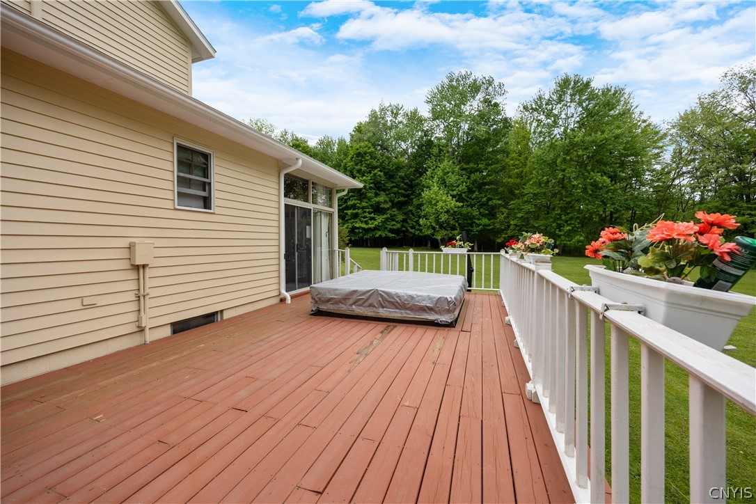 8785 Dinglehole Road Lysander, NY 13027 - Photo 7 of 49 Wrap around Deck with Hot Tub is accessed from bot