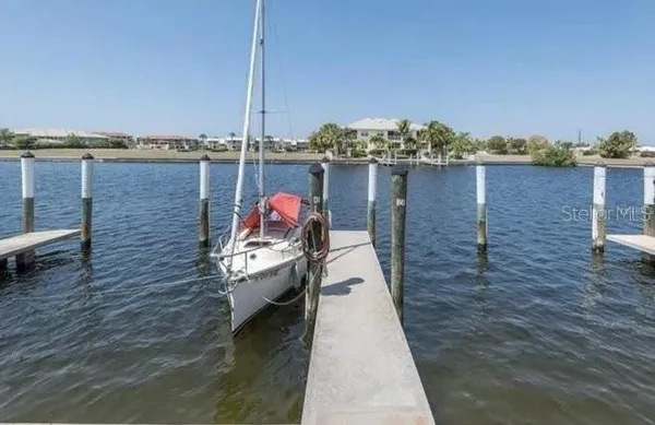 a terrace with outdoor seating and city view