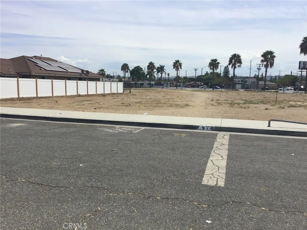 a view of a swimming pool and an outdoor space