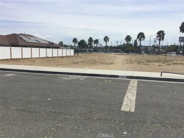 a view of a swimming pool and an outdoor space