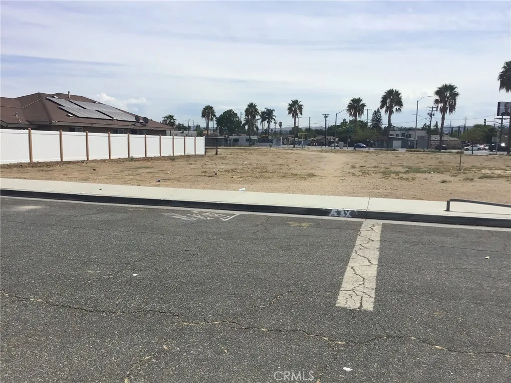 a view of a swimming pool and an outdoor space