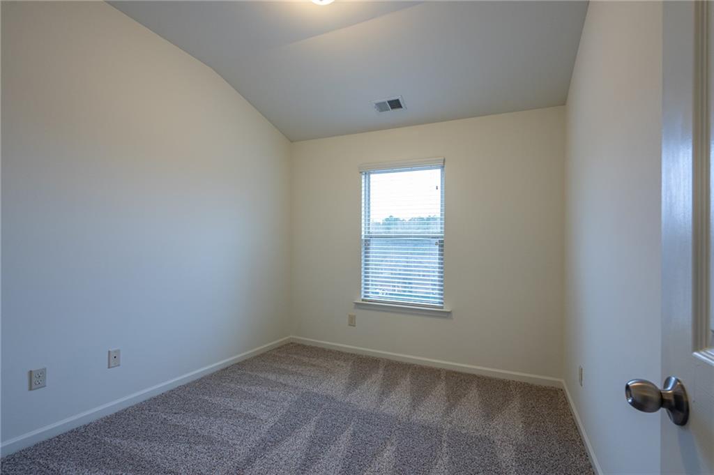 3207 Cyrus Point Lane Kennesaw, GA 30152 - Photo 11 of 24 an empty room with a window