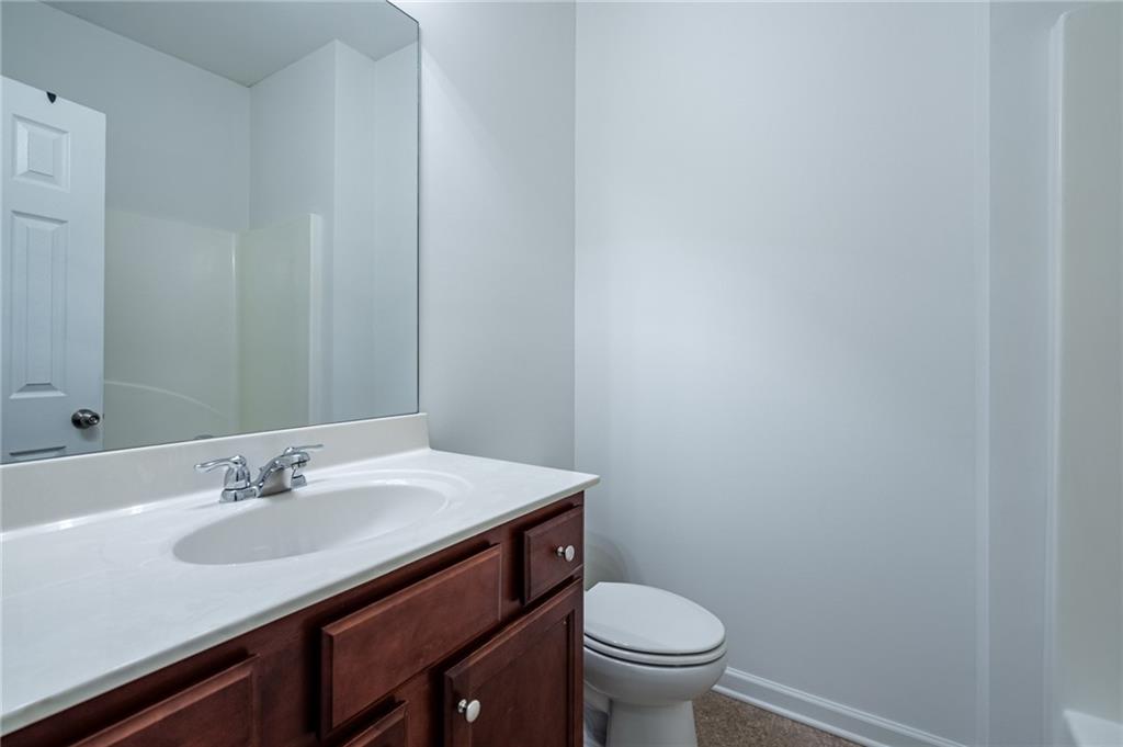 3207 Cyrus Point Lane Kennesaw, GA 30152 - Photo 12 of 24 a bathroom with a sink and a toilet