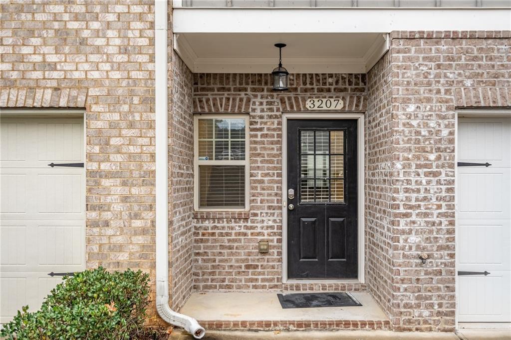 3207 Cyrus Point Lane Kennesaw, GA 30152 - Photo 2 of 24 a view of a door with a door