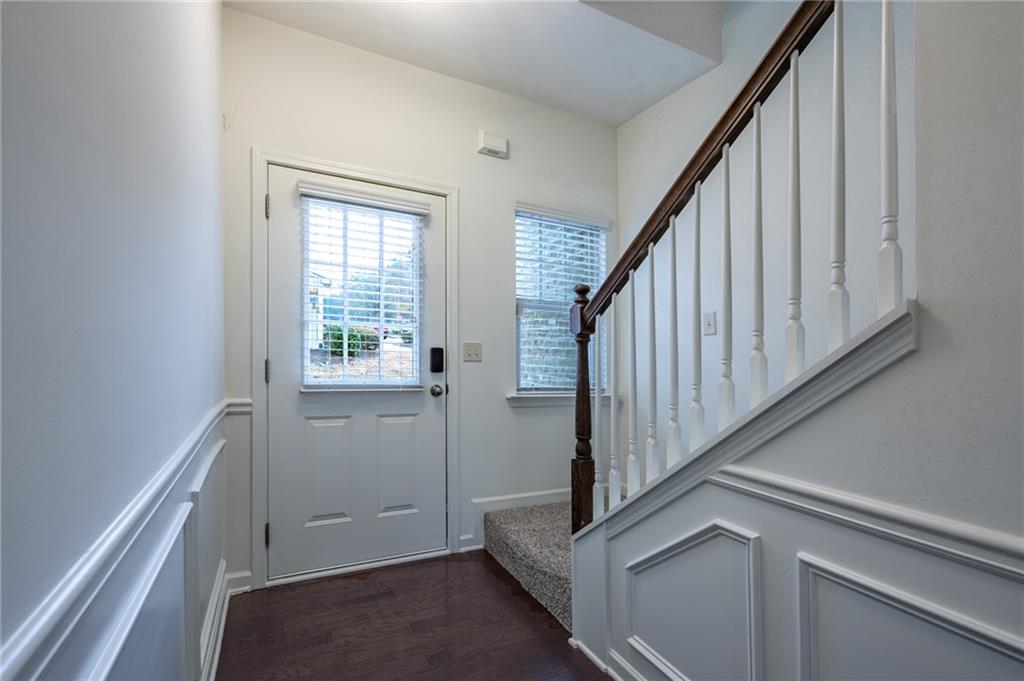 3207 Cyrus Point Lane Kennesaw, GA 30152 - Photo 3 of 24 a view of entryway with wooden floor and stairs