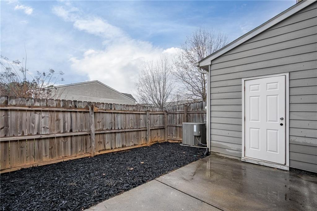 3207 Cyrus Point Lane Kennesaw, GA 30152 - Photo 10 of 24 a view of a house with wooden fence