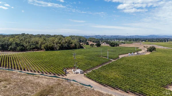 a view of a golf course with a lake