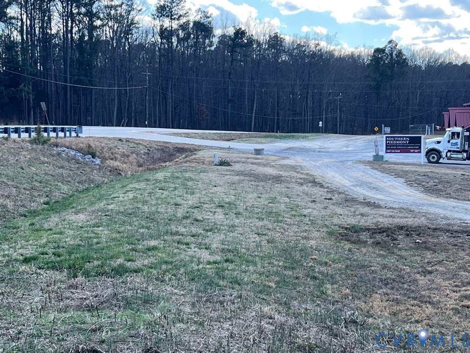 a view of outdoor space with wooden fence