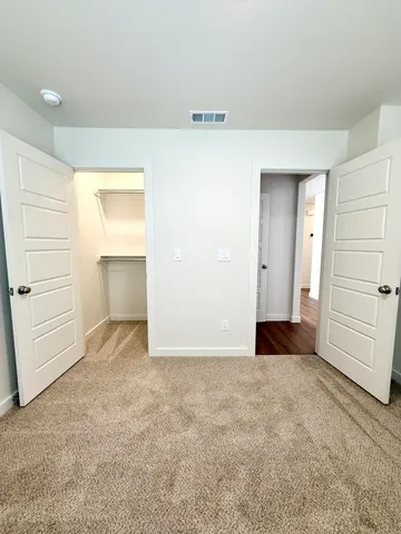 a kitchen with granite countertop a stove top oven and a sink with granite countertops