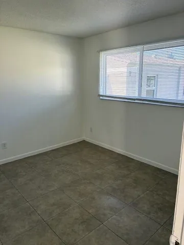 a bathroom with a toilet a sink and bathtub