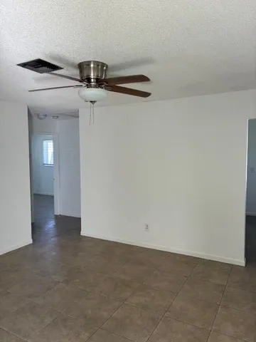 a kitchen with a stove and a sink