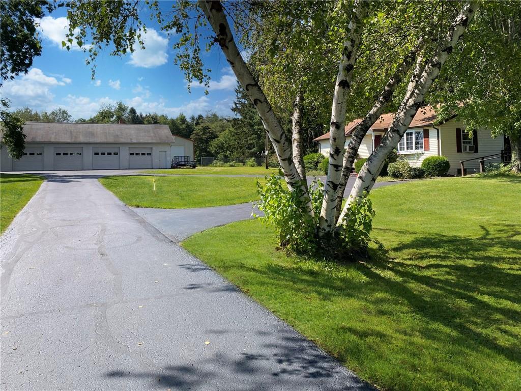 555 West Cornell Road Mercer, PA 16137 - Photo 23 of 25 a view of a house with a yard